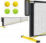 Portable pickleball net system set up on outdoor court with regulation 6.7 m net and carry bag