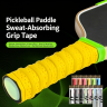 Yellow keel overgrip wrapped on a pickleball paddle handle showing perforated breathable grip tape