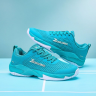 Non-slip rubber outsole with force partitioned tread design for grip on clay and hard courts